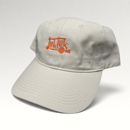 Raree Finds beige cotton strapback dad hat with orange Tuk Tuk Thai embroidered logo and curved brim