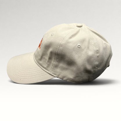 Raree Finds beige cotton strapback dad hat with orange Tuk Tuk Thai embroidery and curved brim side view