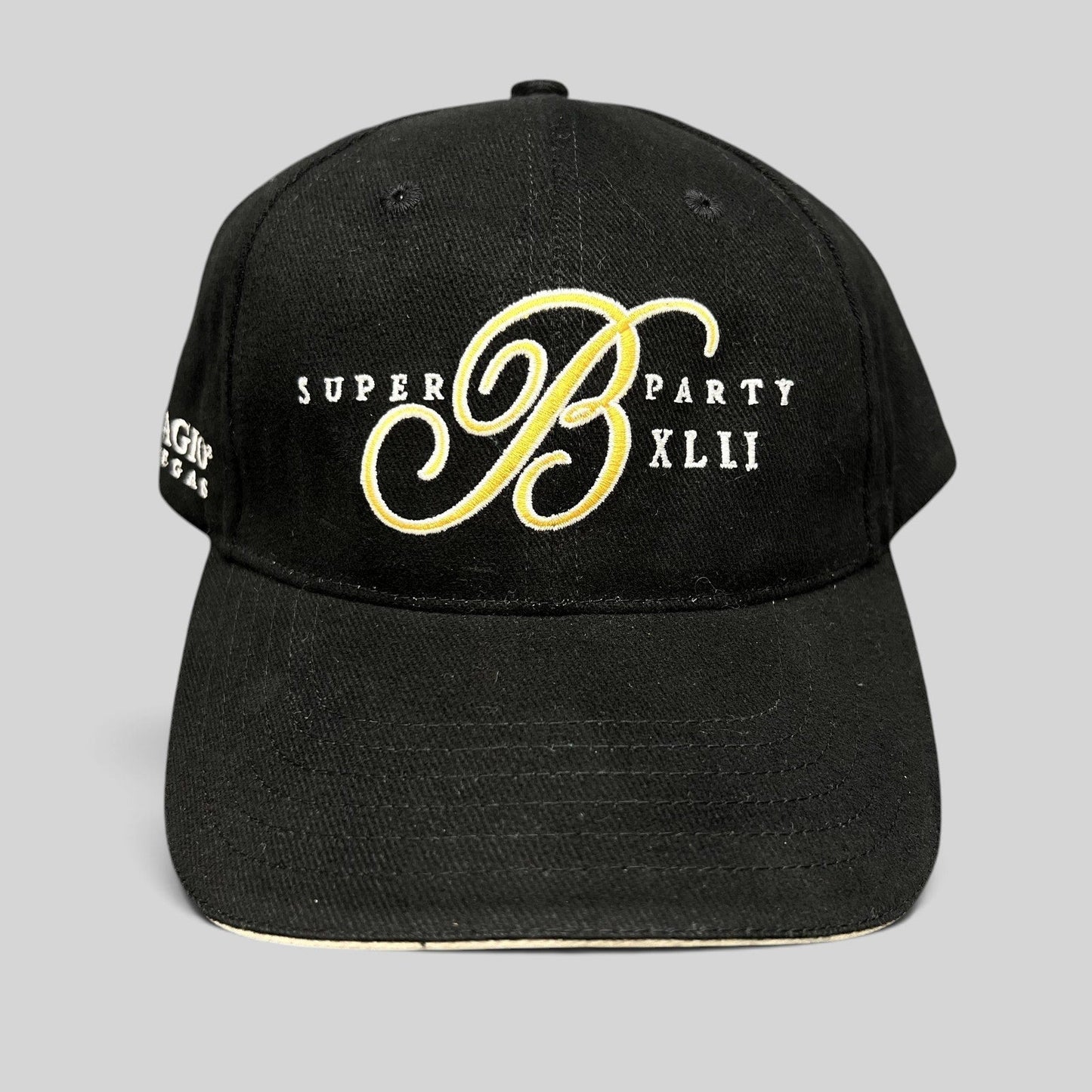 Raree Finds vintage black Bellagio Las Vegas Super Party XLII strapback hat with gold and white embroidered logo