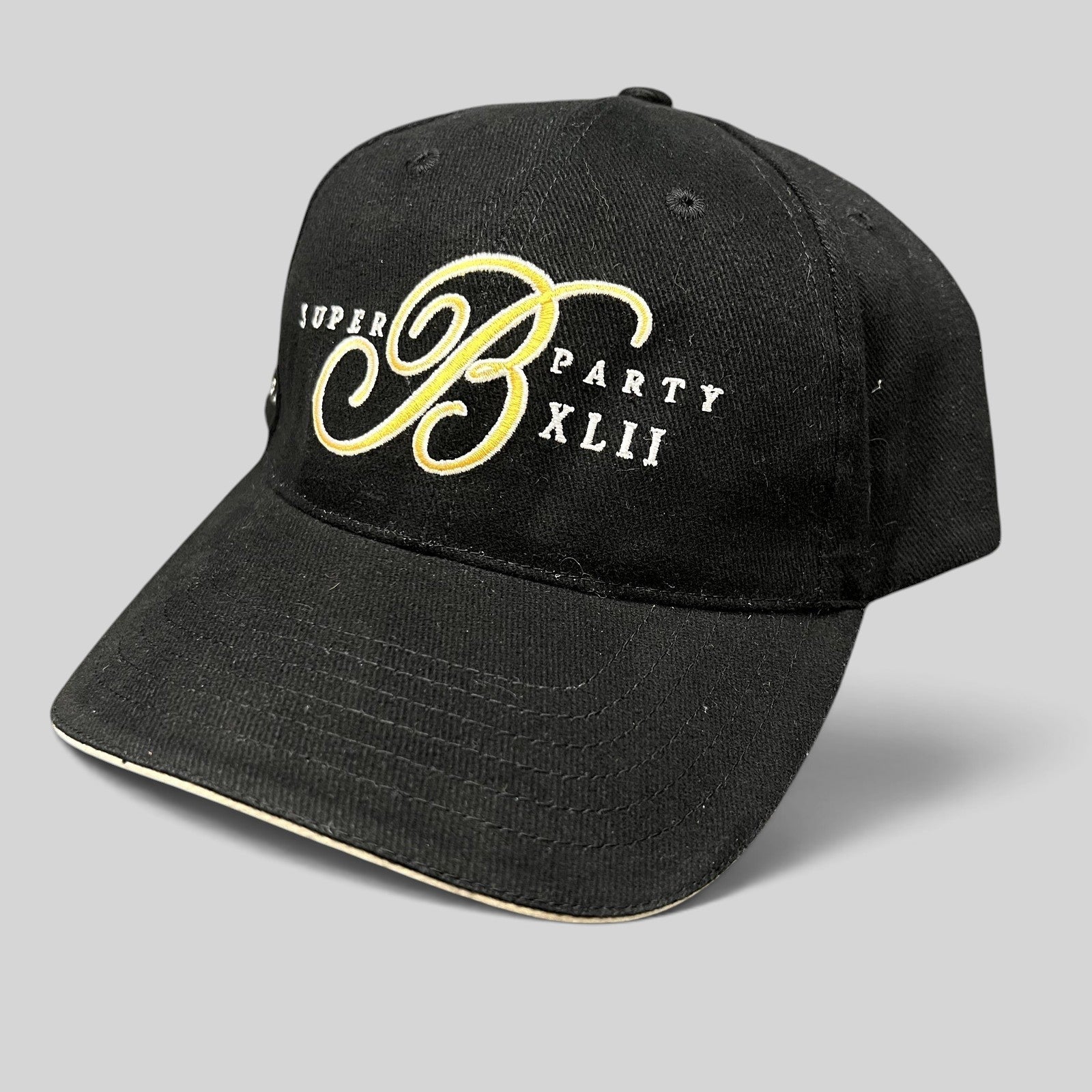 Raree Finds vintage black Bellagio Las Vegas Super Party XLII strapback hat with gold and white embroidered script B