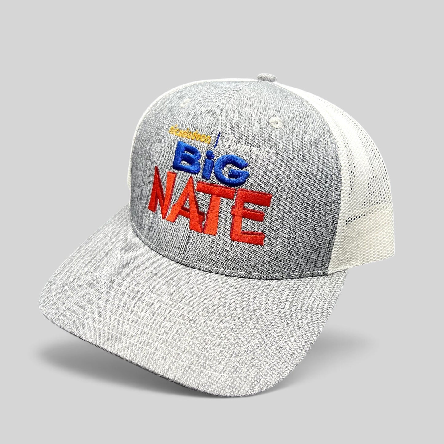 Raree Finds Nickelodeon Big Nate trucker hat with heather gray front, white mesh back, and embroidered logo.