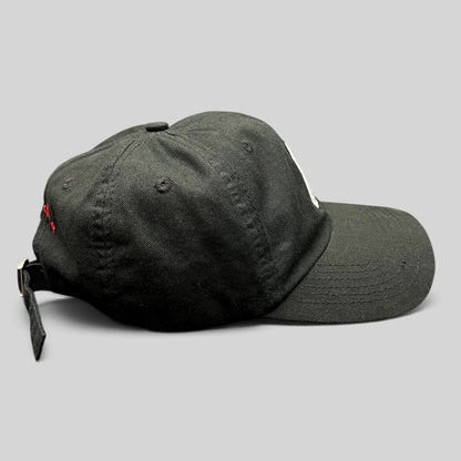 Raree Finds black strapback hat featuring a Notorious B.I.G. Ready To Die front patch and red rear embroidery.