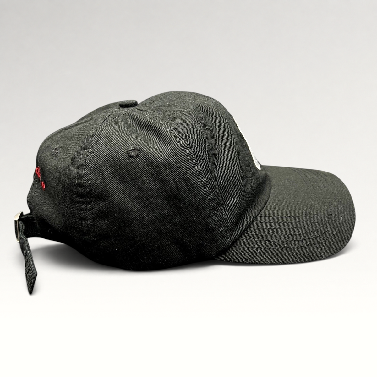 Raree Finds black strapback hat featuring a Notorious B.I.G. Ready To Die front patch and red rear embroidery.