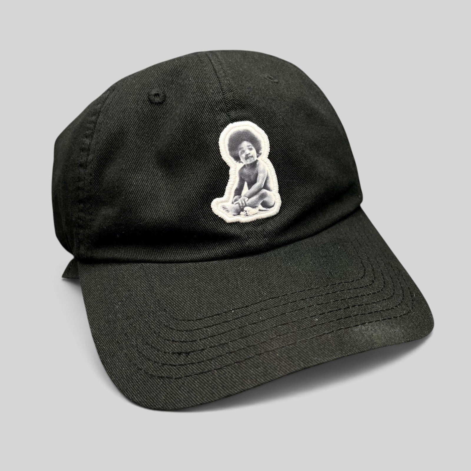 Raree Finds black strapback hat featuring a Ready To Die baby graphic patch inspired by The Notorious B.I.G.