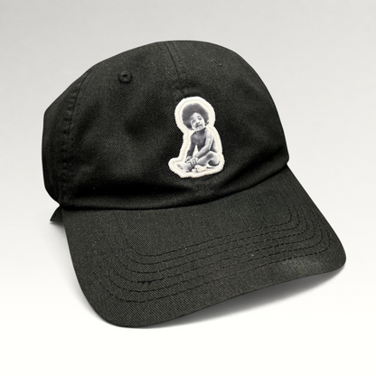 Raree Finds black strapback hat featuring a Ready To Die baby graphic patch inspired by The Notorious B.I.G.