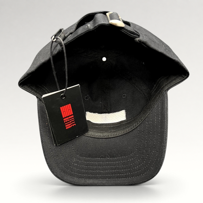 Raree Finds BilleBeino black strapback hat with adjustable metal buckle and attached brand tag