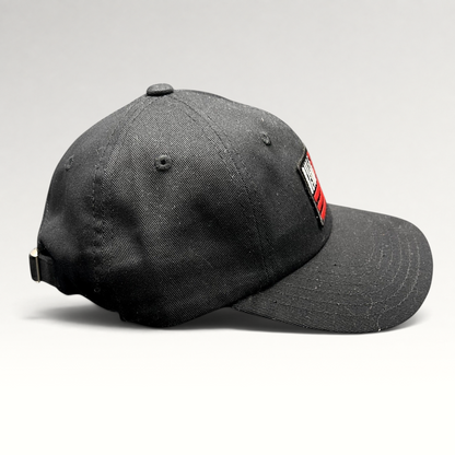 Raree Finds BilleBeino black strapback hat with red embroidered flag logo and adjustable metal buckle closure