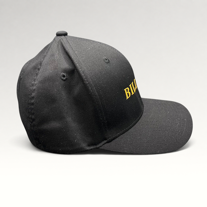 Raree Finds Billions TV show black Yupoong Flexfit hat with gold embroidered logo on a structured crown