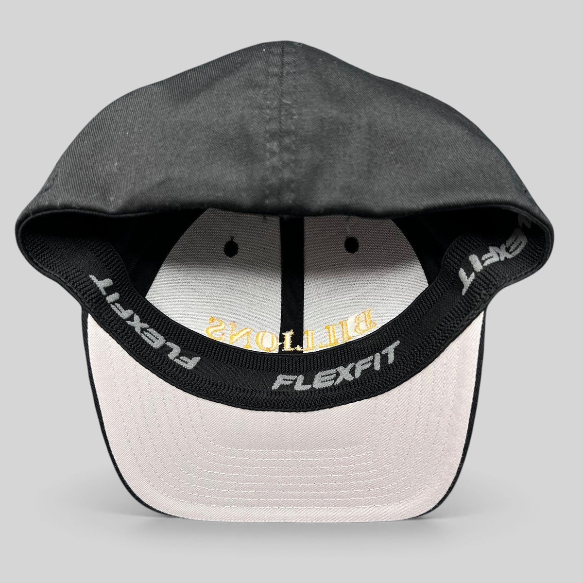 Raree Finds Billions TV show promotional cap in black with gold embroidery on a structured Yupoong Flexfit hat