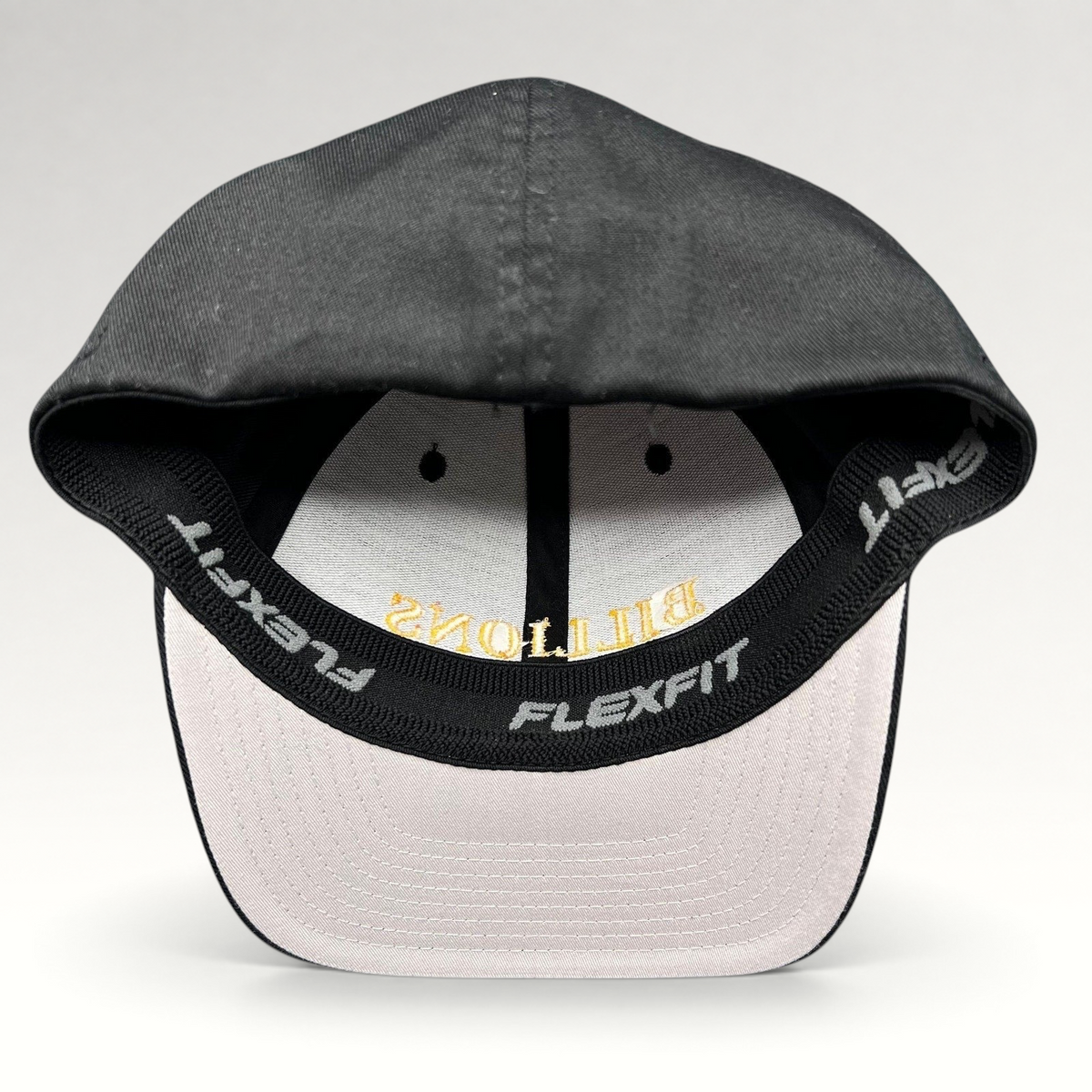 Raree Finds Billions TV show promotional cap in black with gold embroidery on a structured Yupoong Flexfit hat