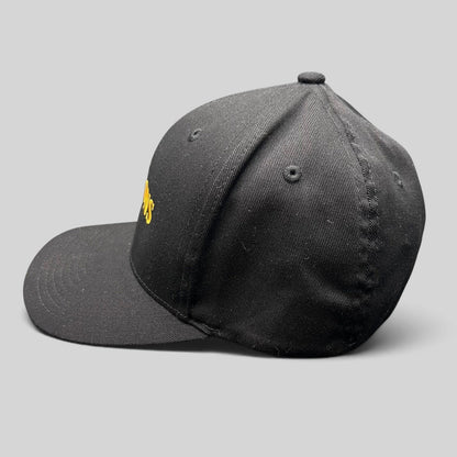 Raree Finds Billions TV show promotional black Yupoong Flexfit hat with gold embroidered logo on a structured crown