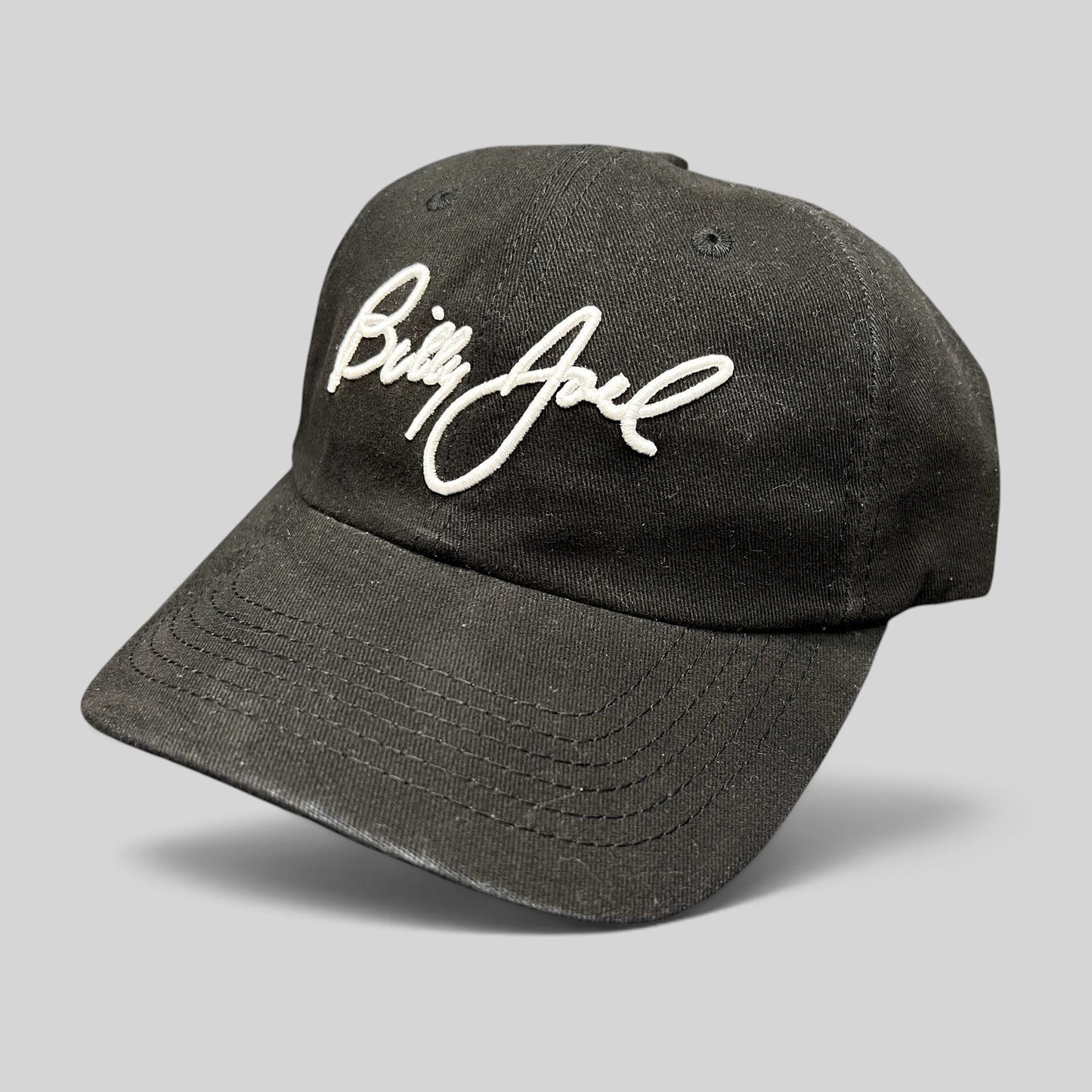 Raree Finds black Billy Joel In Concert strapback hat with white script embroidery on the front crown