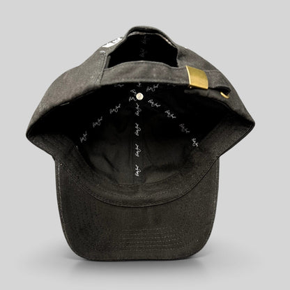 Raree Finds Billy Joel black strapback hat showing interior branded taping and brass buckle closure