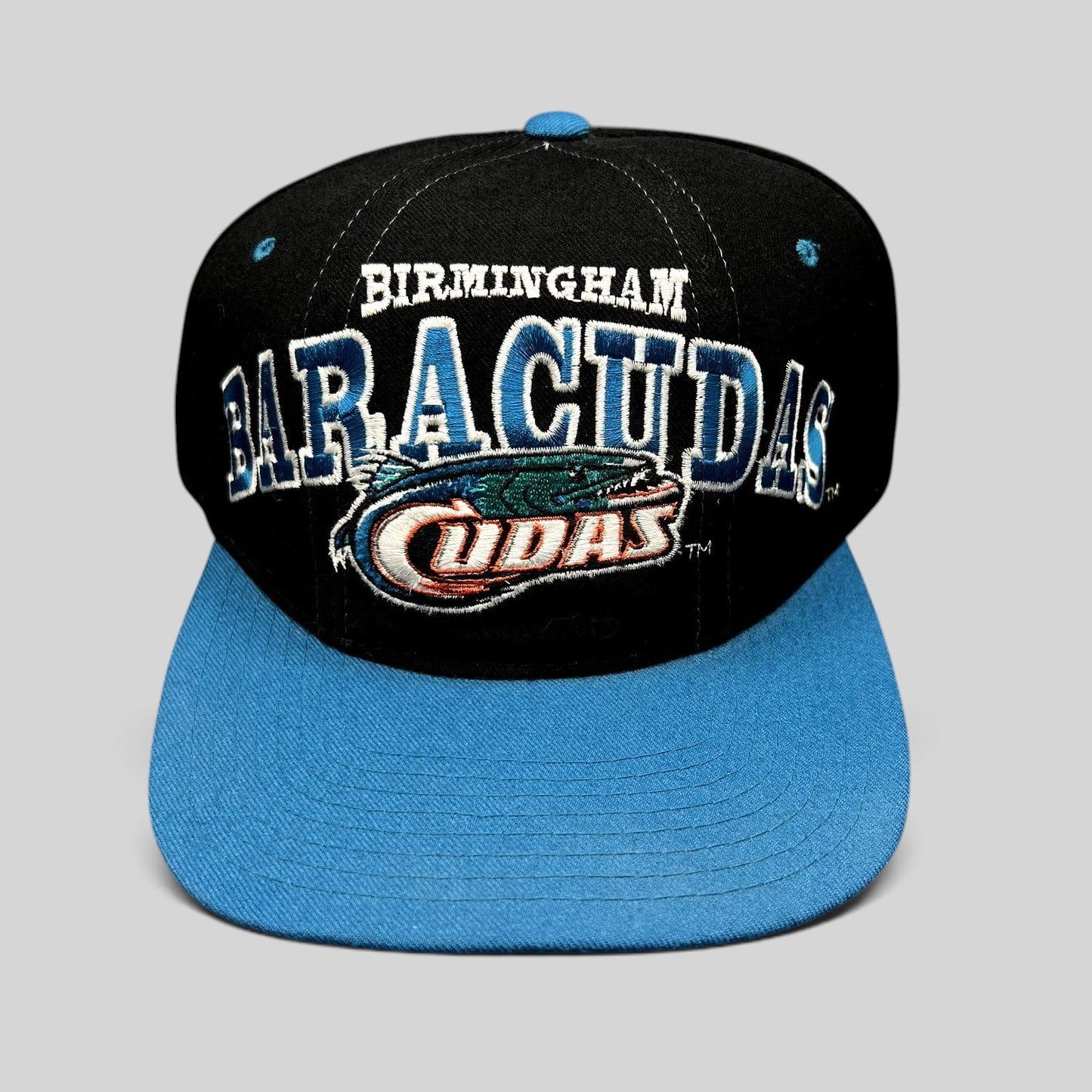 Raree Finds vintage Birmingham Barracudas CFL Starter snapback hat in black and teal wool with oversized embroidery.