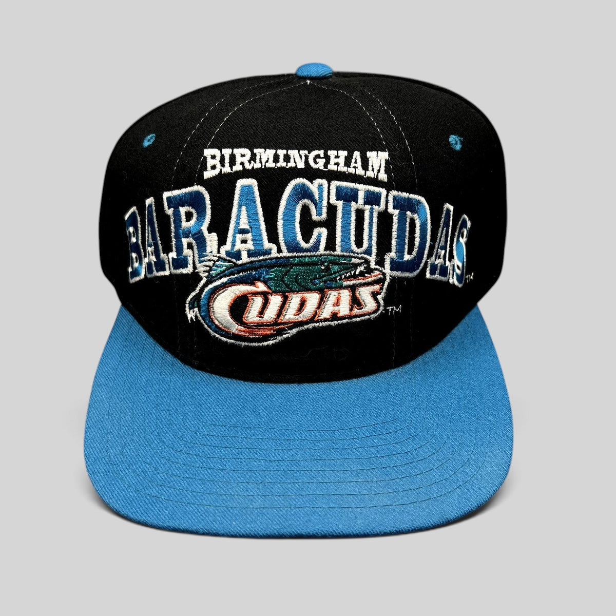 Raree Finds vintage Birmingham Barracudas CFL Starter snapback hat in black and teal wool with oversized embroidery.