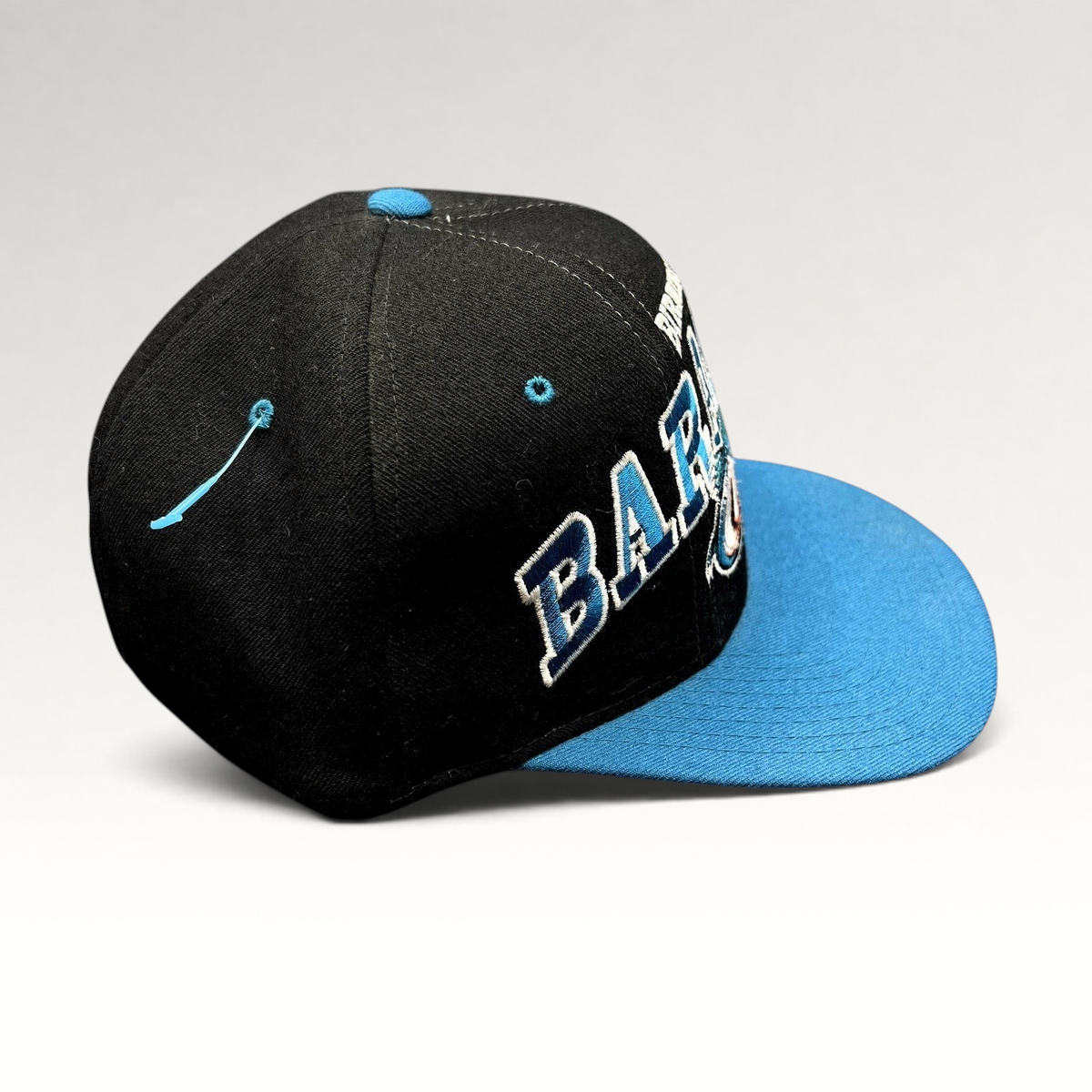 Raree Finds vintage 1995 Birmingham Barracudas CFL Starter snapback hat in black and teal wool with oversized embroidery