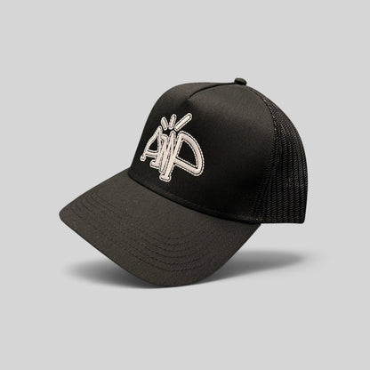 Raree Finds black mesh trucker hat with white embroidered AMP logo, structured crown, and adjustable snapback closure.