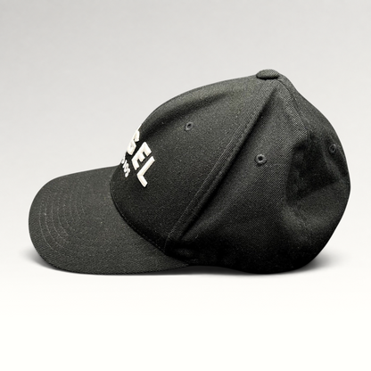 Raree Finds black Flexfit cap with white embroidered Angel Studios logo and curved brim, side profile view.