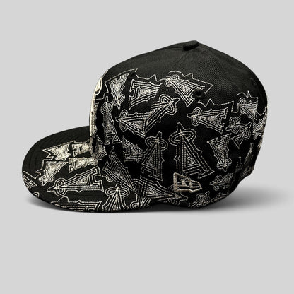 Raree Finds black New Era 59FIFTY Los Angeles Angels fitted hat with silver embroidered all-over logo pattern