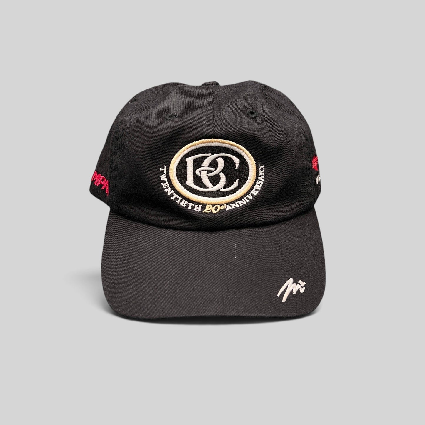 Raree Finds black unstructured cotton hat featuring a BC 20th anniversary emblem and Sprint side embroidery.
