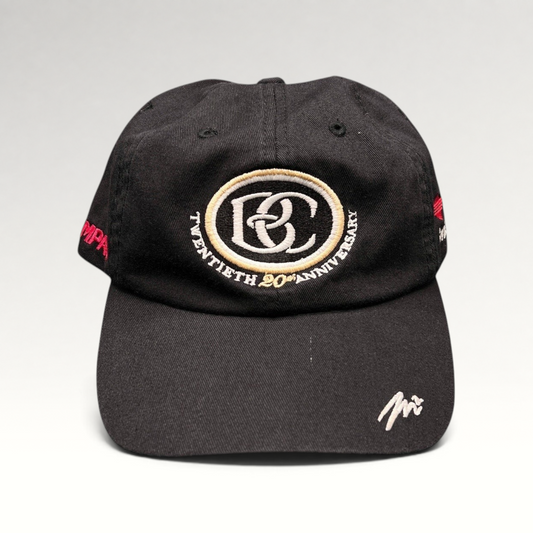 Raree Finds black unstructured cotton hat featuring a BC 20th anniversary emblem and Sprint side embroidery.