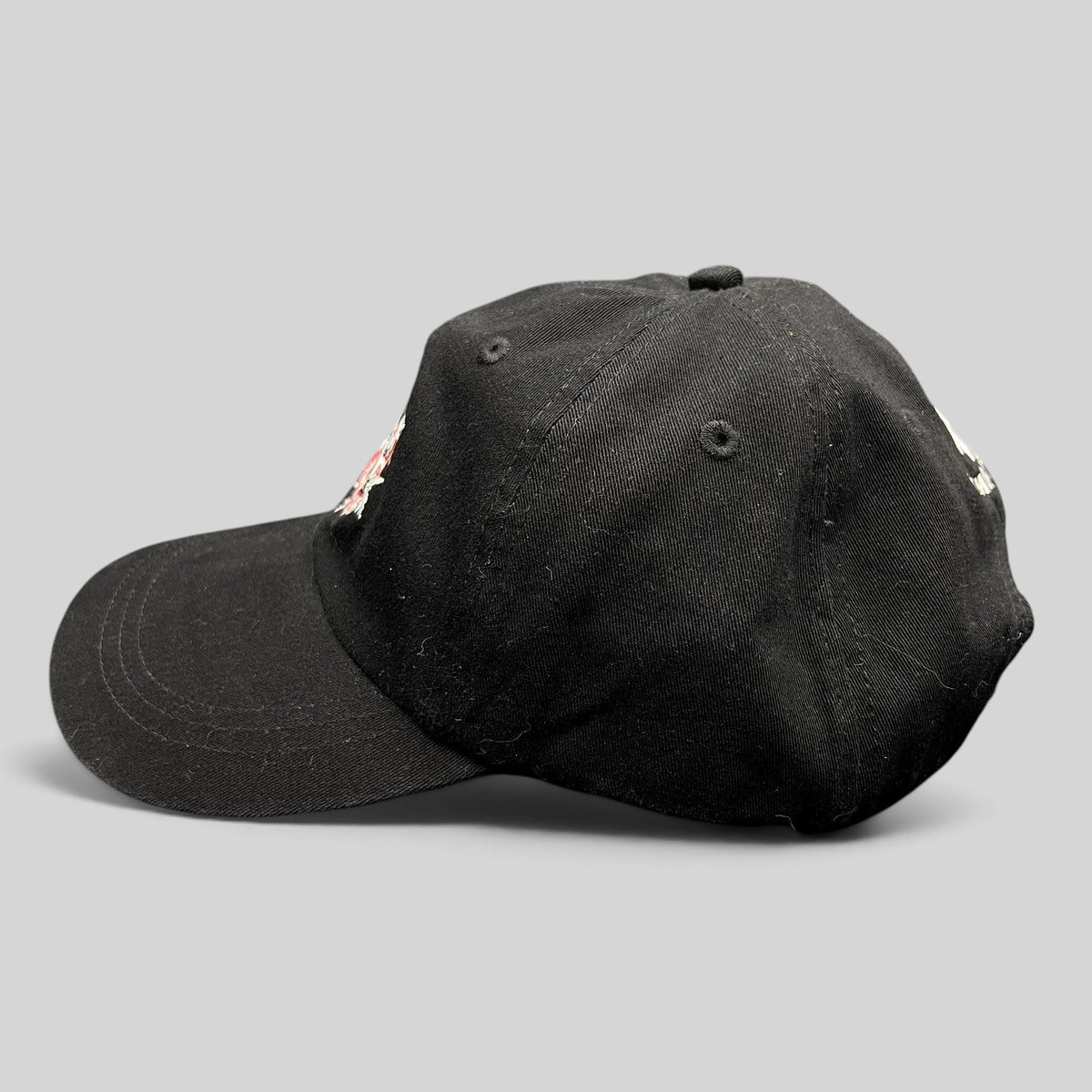Raree Finds vintage black Ouray Sportswear ASPA Ski Patrol strapback hat with embroidered front and rear logo details.