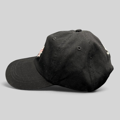 Raree Finds vintage black Ouray Sportswear ASPA Ski Patrol strapback hat with embroidered front and rear logo details.