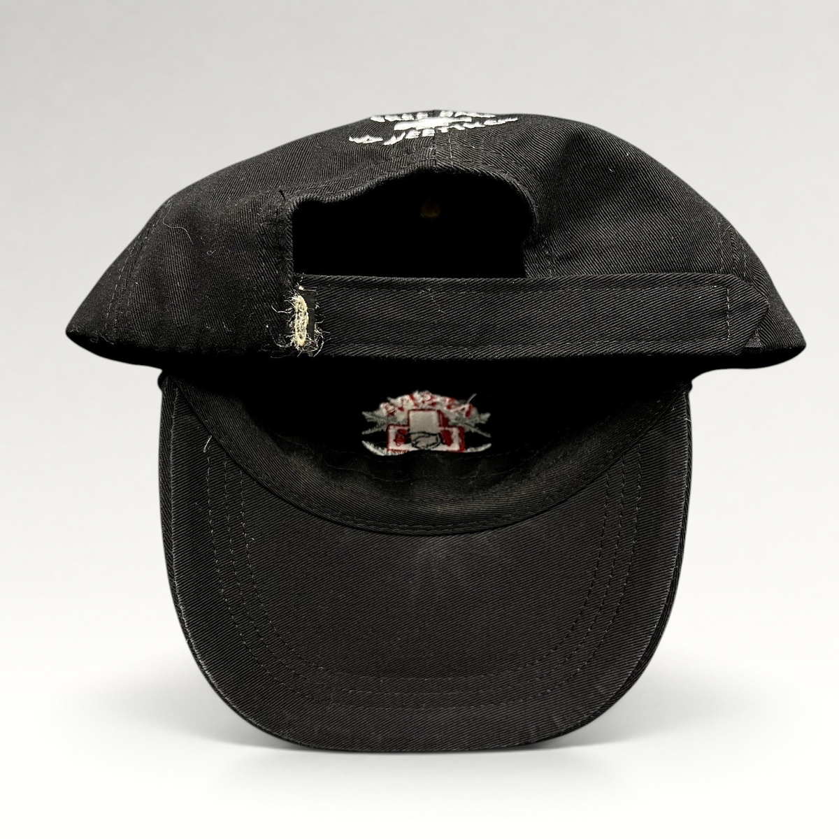 Raree Finds vintage black cotton ASPA Ski Patrol strapback hat with Free Beer At Meetings embroidery on the back