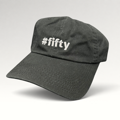 Raree Finds black cotton strapback hat with white #fifty embroidery, celebrating the Aspen 2017 anniversary.