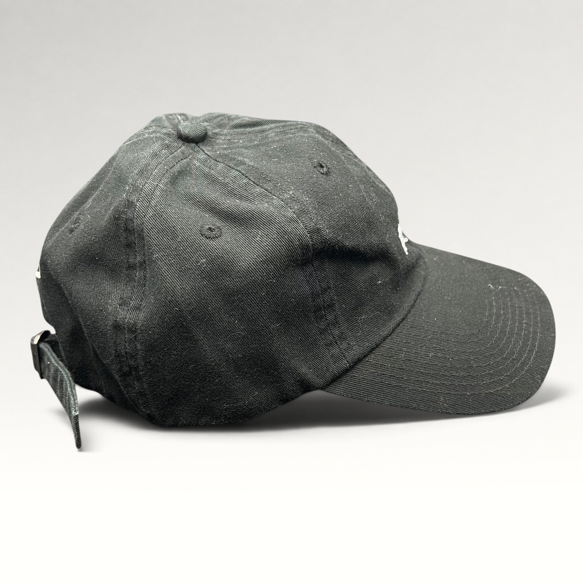 Raree Finds black cotton strapback hat with Aspen 2017 anniversary embroidery and adjustable back strap
