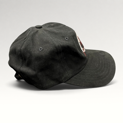 Raree Finds vintage black Y2K Aspen Winternational 2000 Chevy Trucks strapback ski hat with embroidered skier logo.