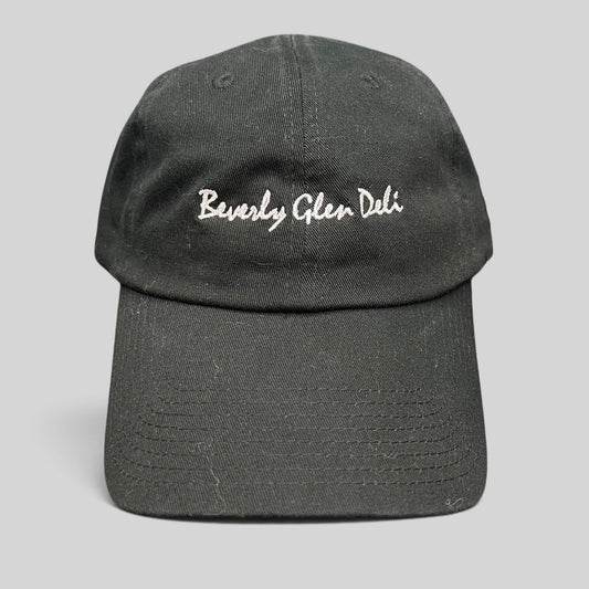 Raree Finds black cotton strapback hat with white Beverly Glen Deli cursive script embroidery on the front