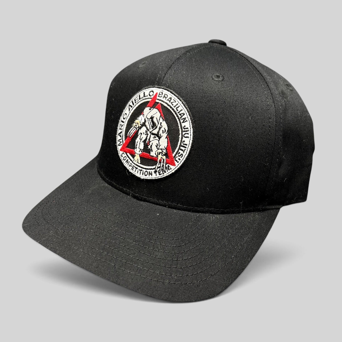 Raree Finds black Yupoong snapback hat with Mario Aiello Brazilian Jiu Jitsu competition team embroidered patch