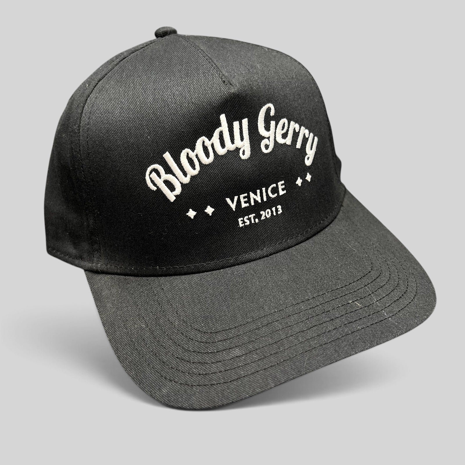 Raree Finds black Otto Cap snapback hat with white embroidered Bloody Gerry Venice California branding