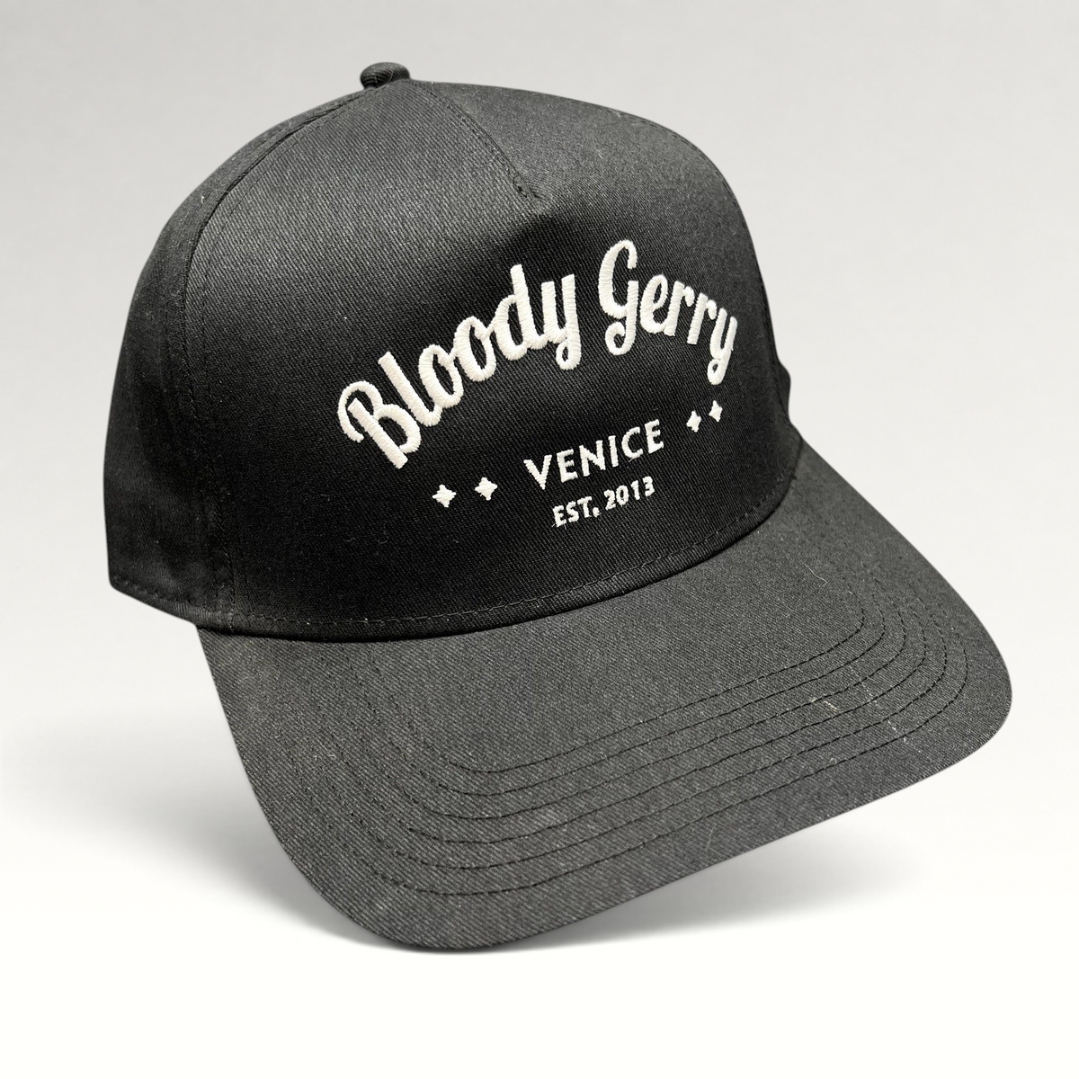 Raree Finds black Otto Cap snapback hat with white embroidered Bloody Gerry Venice California branding