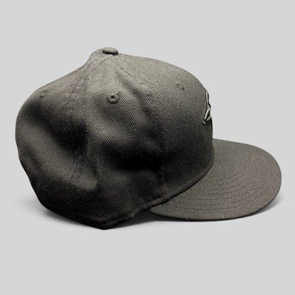 Raree Finds New Era Toronto Blue Jays black snapback hat with flat brim and red maple leaf embroidery detail