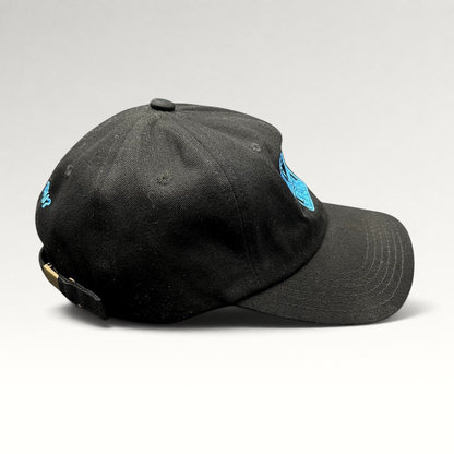Raree Finds black cotton strapback hat with blue diamond logo and Do You Ski embroidery in a vintage ski style.