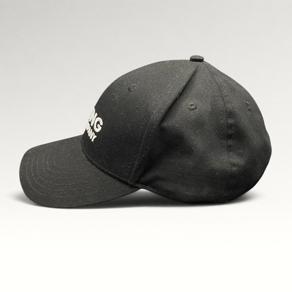Raree Finds black The Boring Company strapback hat with white embroidered logo and curved brim, side profile view.