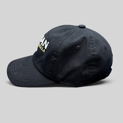 Raree Finds black cotton strapback hat with Botran Ron de Guatemala No. 18 embroidery in white and gold