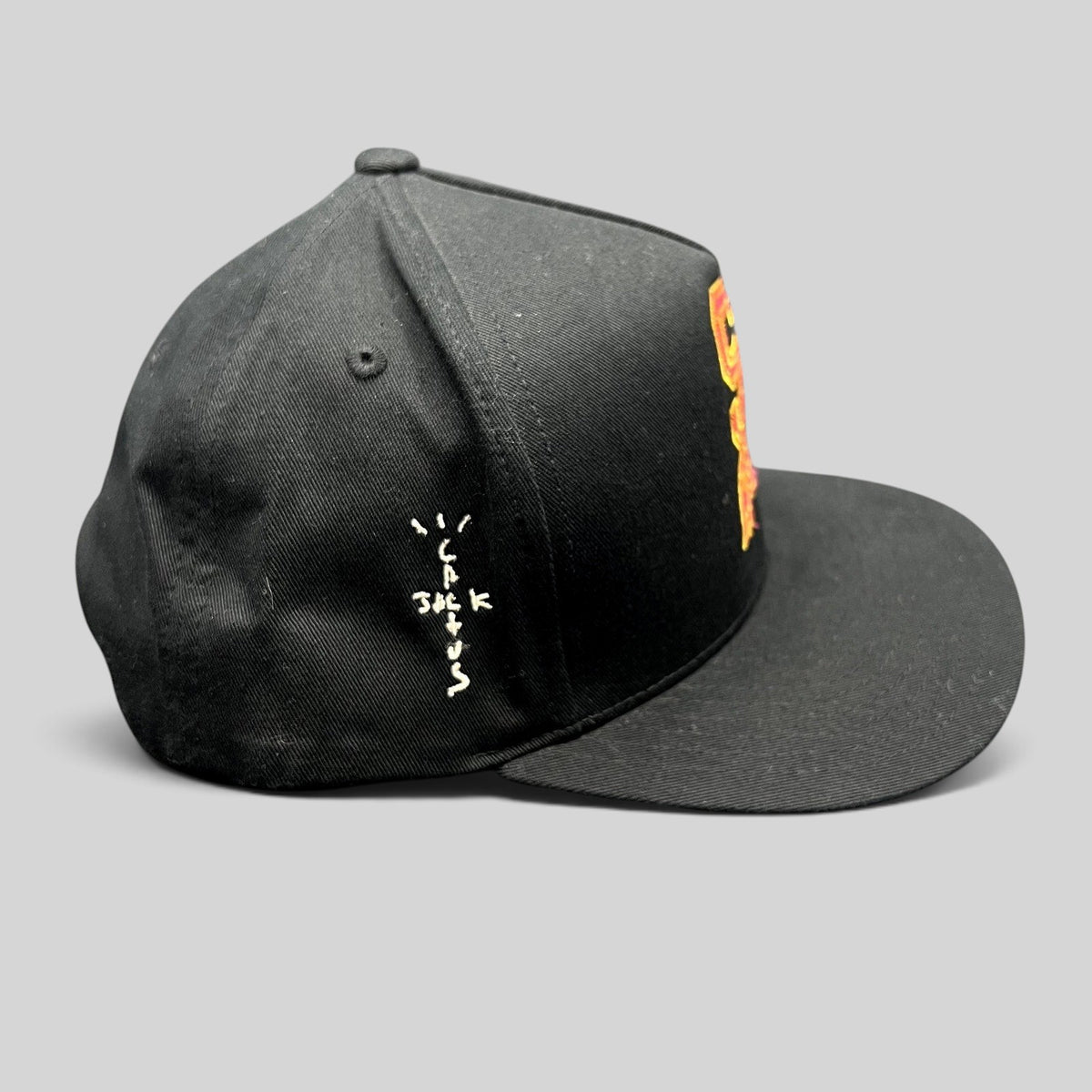 Raree Finds black snapback hat with Cactus Jack embroidery on the side and a flat brim