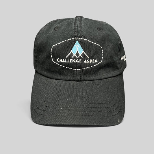 Raree Finds black cotton strapback hat featuring embroidered Challenge Aspen logo on the front
