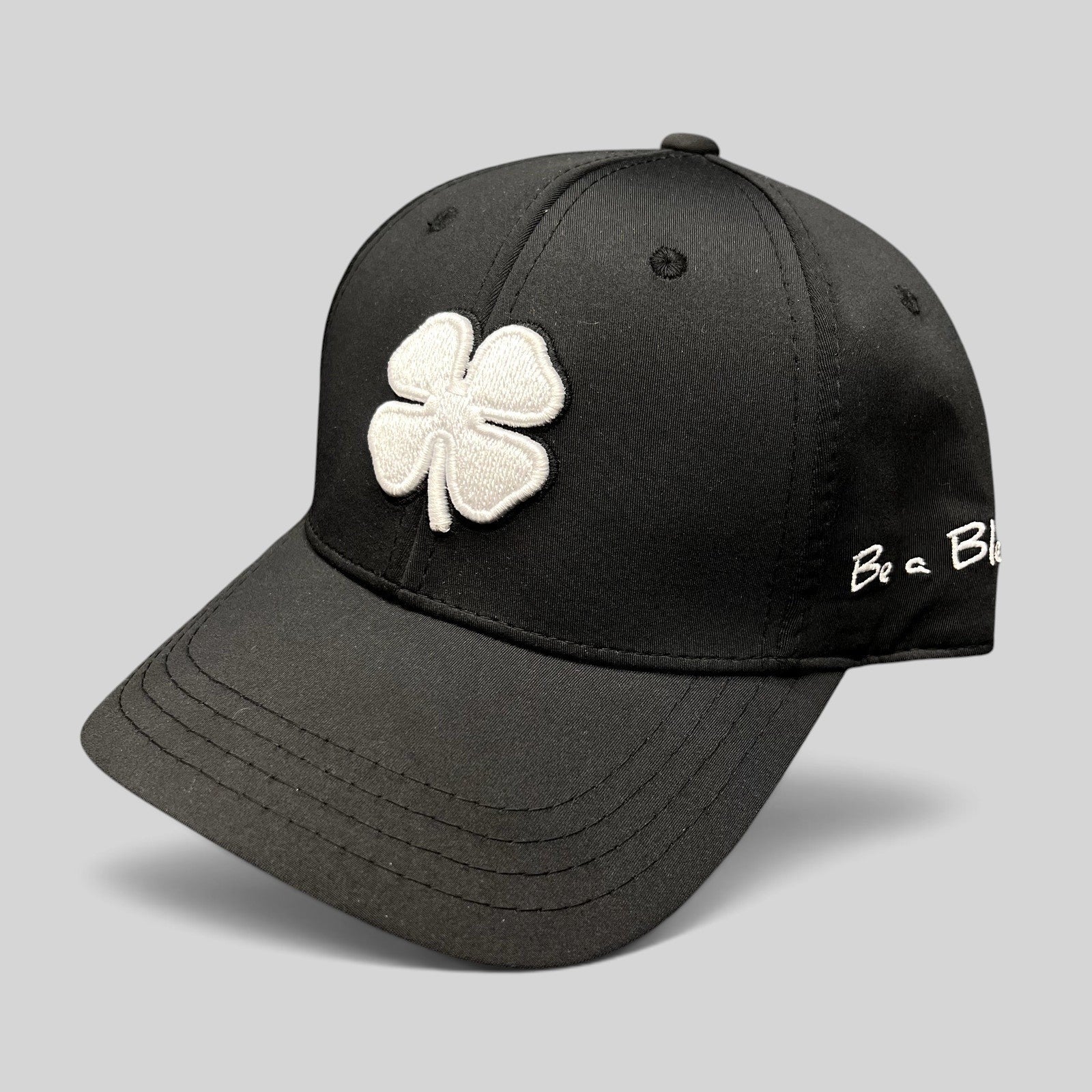 Raree Finds Black Clover Tony Robbins Blessed 2024 black snapback golf hat with white embroidered clover logo