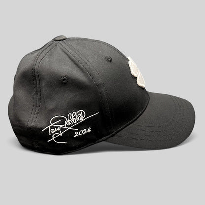 Raree Finds black snapback golf hat with white clover logo and Tony Robbins Blessed 2024 embroidery on the side