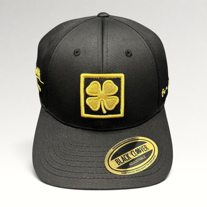 Raree Finds Black Clover x Tony Robbins 2026 limited edition black snapback hat with gold clover patch and embroidery