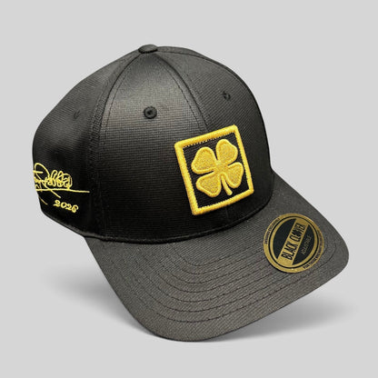 Raree Finds Black Clover x Tony Robbins 2026 limited edition black snapback hat with gold clover patch and embroidery