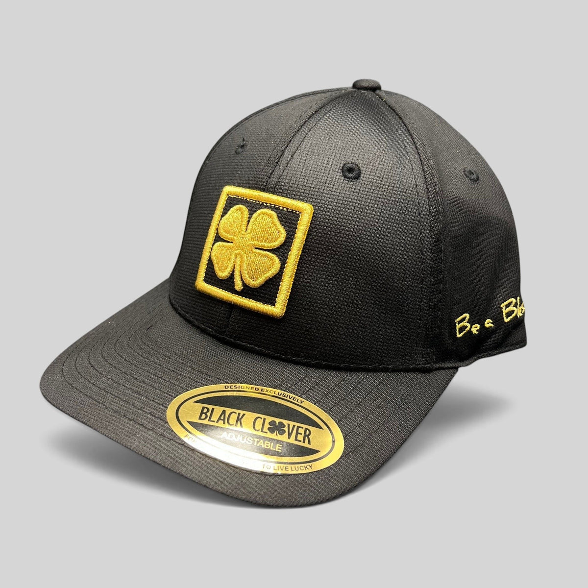 Raree Finds Black Clover x Tony Robbins 2026 limited edition black snapback hat with gold clover patch and embroidery