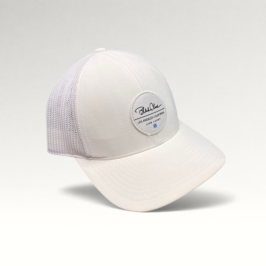 Raree Finds Black Clover white trucker hat with Live Lucky circular patch and blue clover detail on mesh back