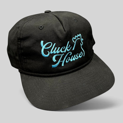 Raree Finds black Richardson Outdoor snapback hat with aqua blue Cluck House script embroidery and front rope detail.