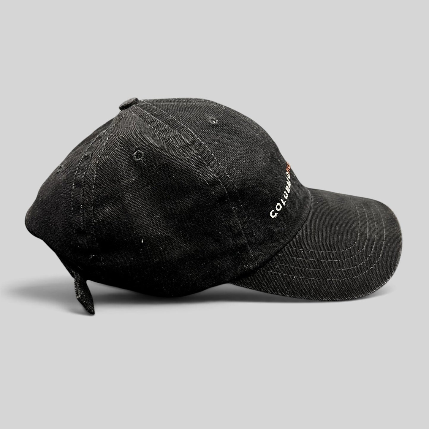 Raree Finds black Colorado Film Commission six-panel strapback hat with pre-curved brim and embroidered logo