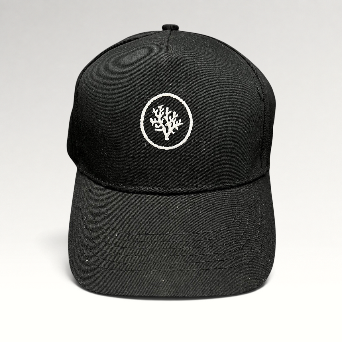 Raree Finds black Coral Gardeners strapback cap with white embroidered coral logo on the front